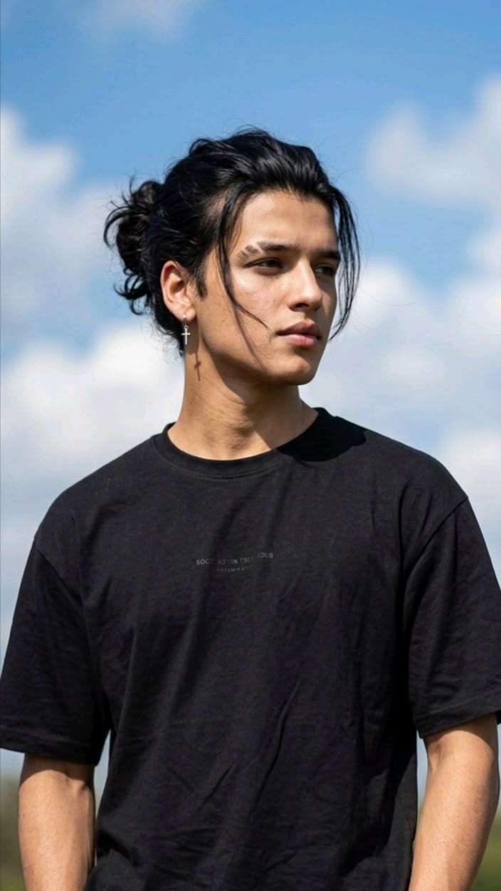 thetic_Young_Man_with_Long_Black_Hair_Bu